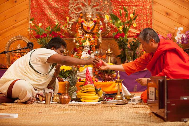 Puja with priest and Swamiji in the main Yoga hall