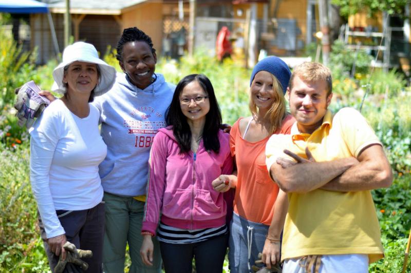 Students have fun in the permaculture garden at the Yoga Farm.