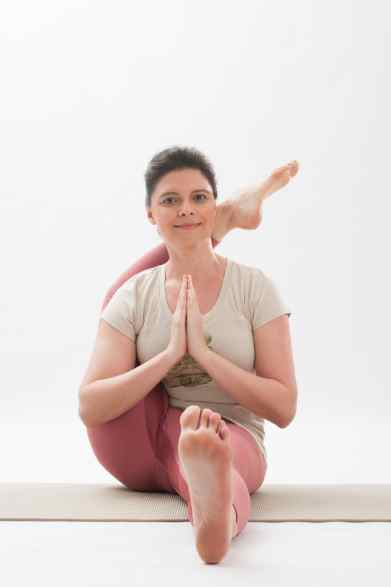 additional yoga pose foot behind head