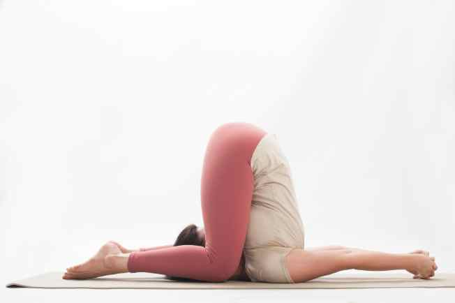 additional yoga pose knees to ears