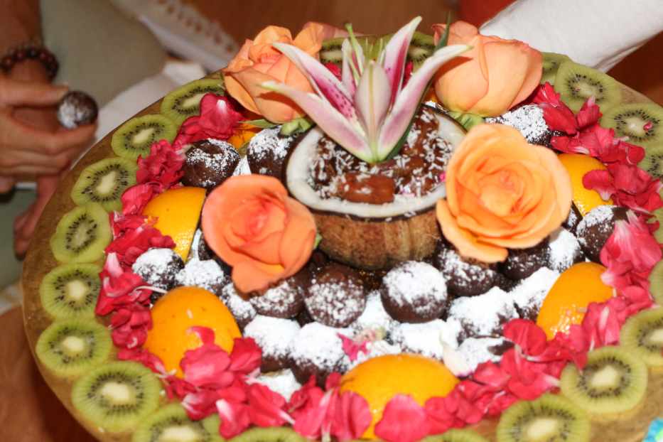 Beautifully prepared prasad with fruits, flowers and sweets 
